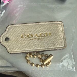 Coach Off White Leather Tag Keychain with Gold Logo